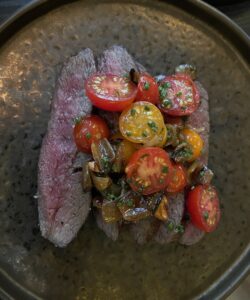 charcoal-grilled Miyazaki A5 Wagyu with tomato concasse at RO Restaurant & Lounge, Yountville